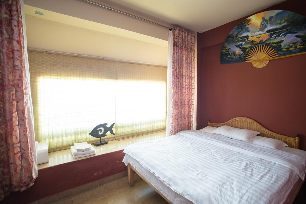 G.T. Guest House Garapan Rom bilde