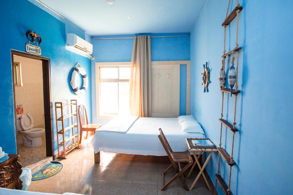 G.T. Guest House Garapan Rom bilde
